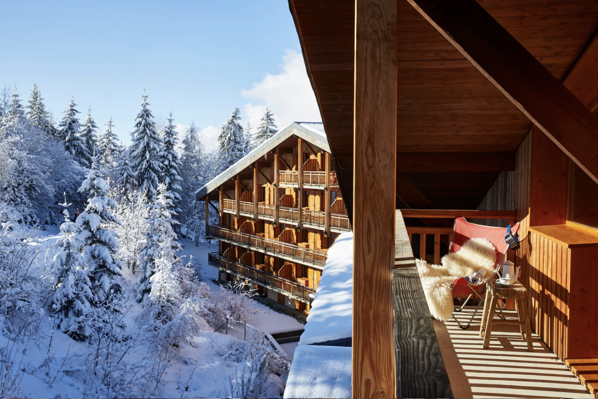Luxury wooden chalet in snow-covered Megève village during a corporate ski incentive trip by Rockitfish